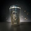 Black insulated mug with an engraving of a pet's picture
